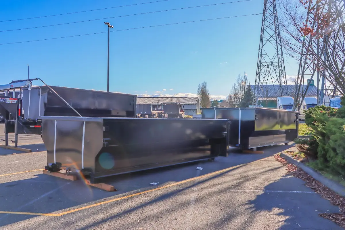 Roll-off dumpster ready for waste disposal at job site for 2 Yard Dumpster Rental in Hannibal
